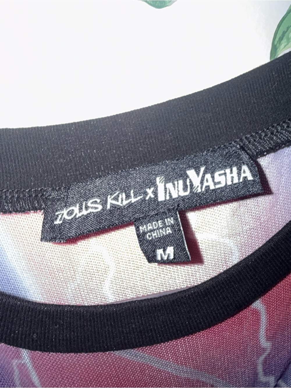 Dolls Kill Purple and Black Anime Long-Sleeve Crop Top - Picture 2 of 3